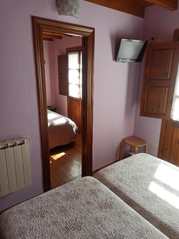 Postel nebo postele na pokoji v ubytování CASA ALDEA LOS CASTAÑOS