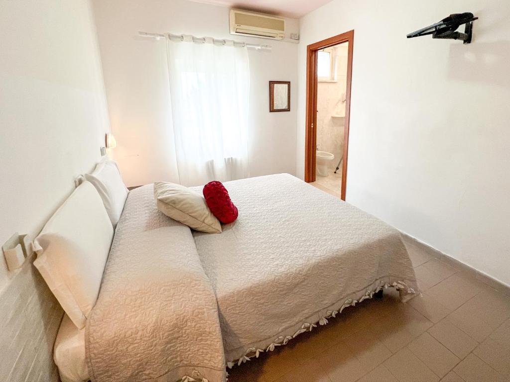 A bed or beds in a room at lidodubaihotel