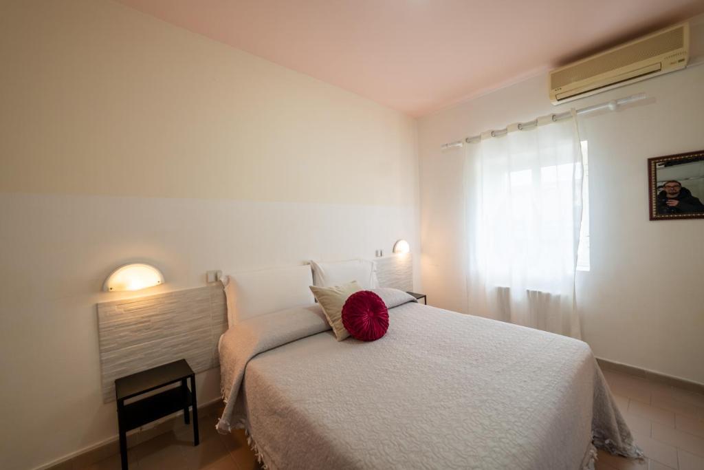 A bed or beds in a room at lidodubaihotel