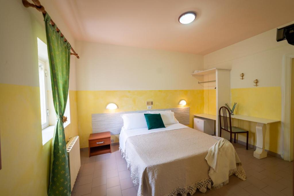 A bed or beds in a room at lidodubaihotel
