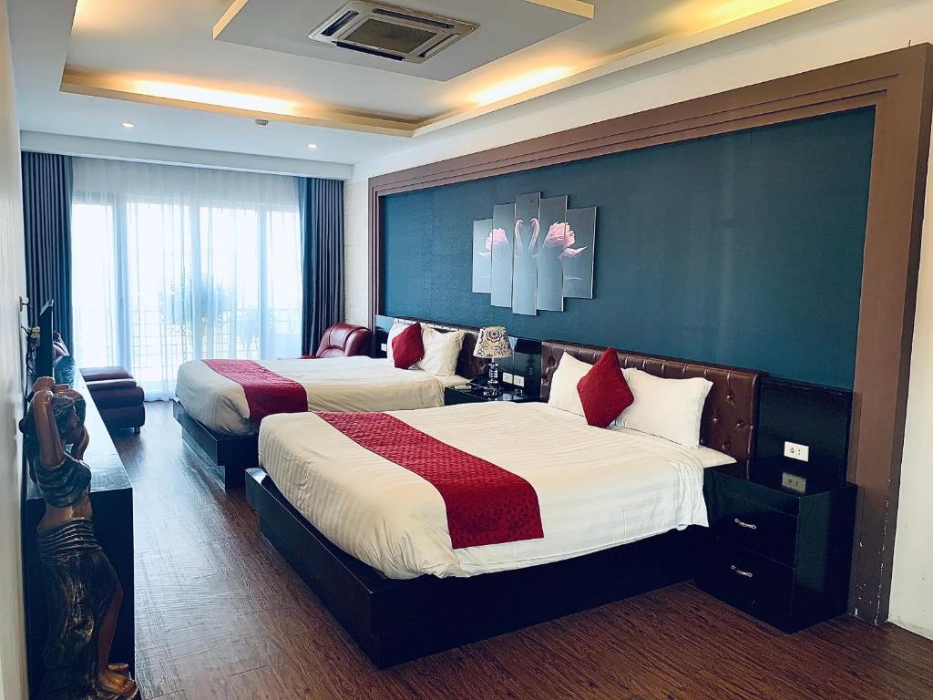 Tempat tidur dalam kamar di Eclipse Legend Hotel