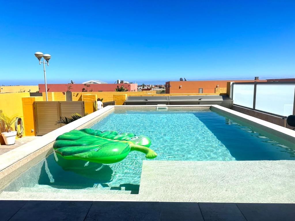 The swimming pool at or close to Cloud Tropical - Piscina climatizada - Gym Privado
