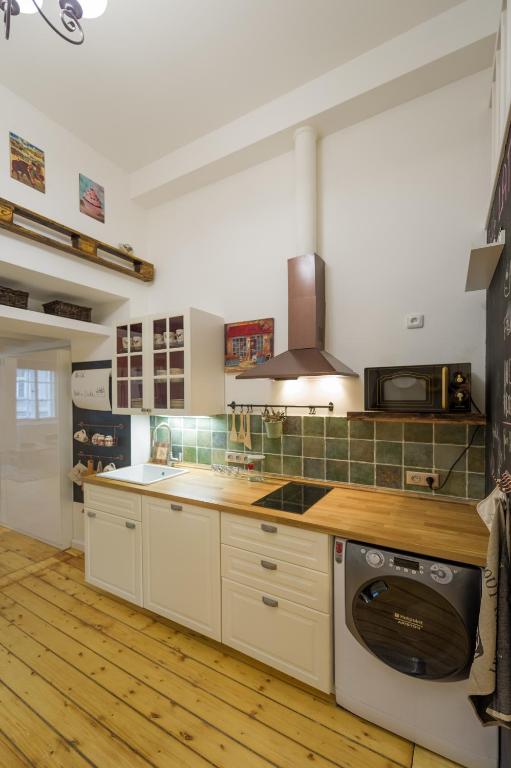 Kuchyň nebo kuchyňský kout v ubytování The Spot Apartment
