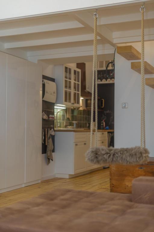Kuchyň nebo kuchyňský kout v ubytování The Spot Apartment
