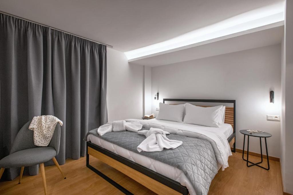 Postel nebo postele na pokoji v ubytování Traveleclectic Apartments
