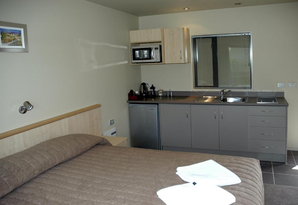 Kuchyň nebo kuchyňský kout v ubytování Kaikoura Gateway Motor Lodge