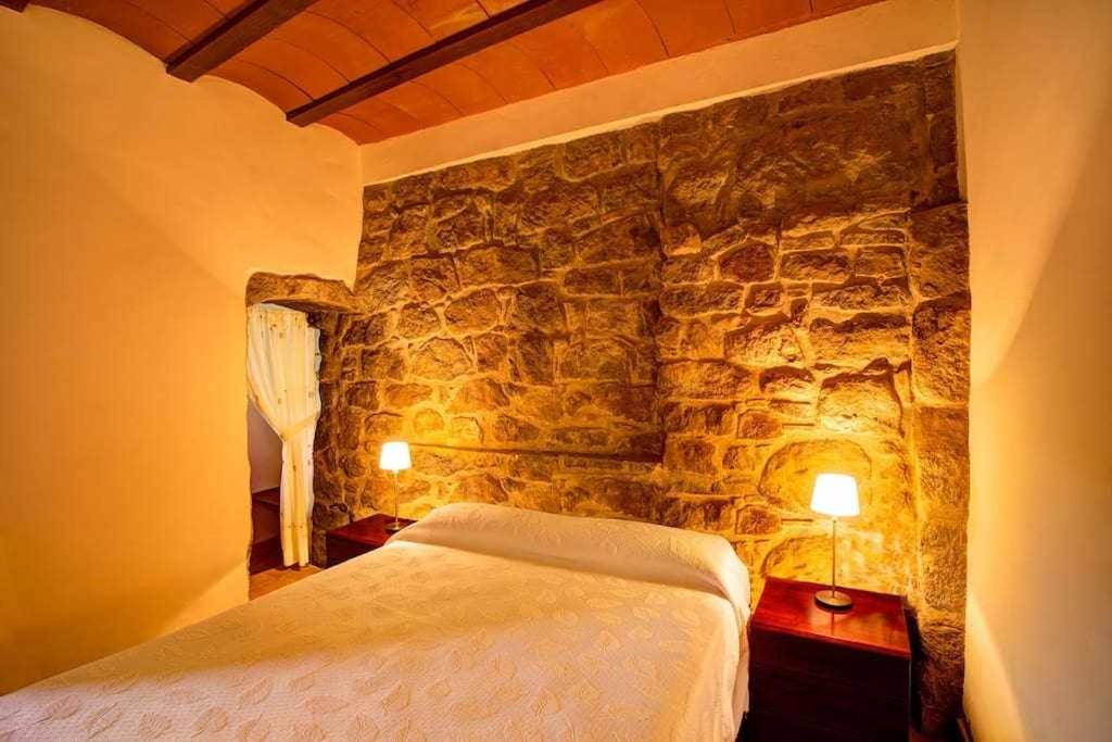 Posteľ alebo postele v izbe v ubytovaní Masia Mas d'en Bosch Casa Rural Baronia de Rialb