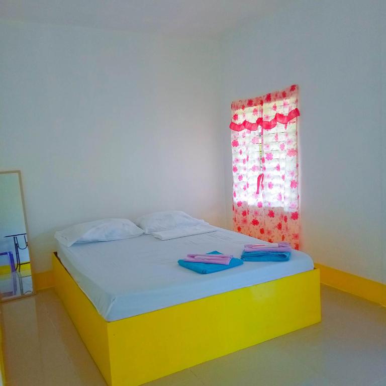 Postel nebo postele na pokoji v ubytování Scott Camotes Beach House