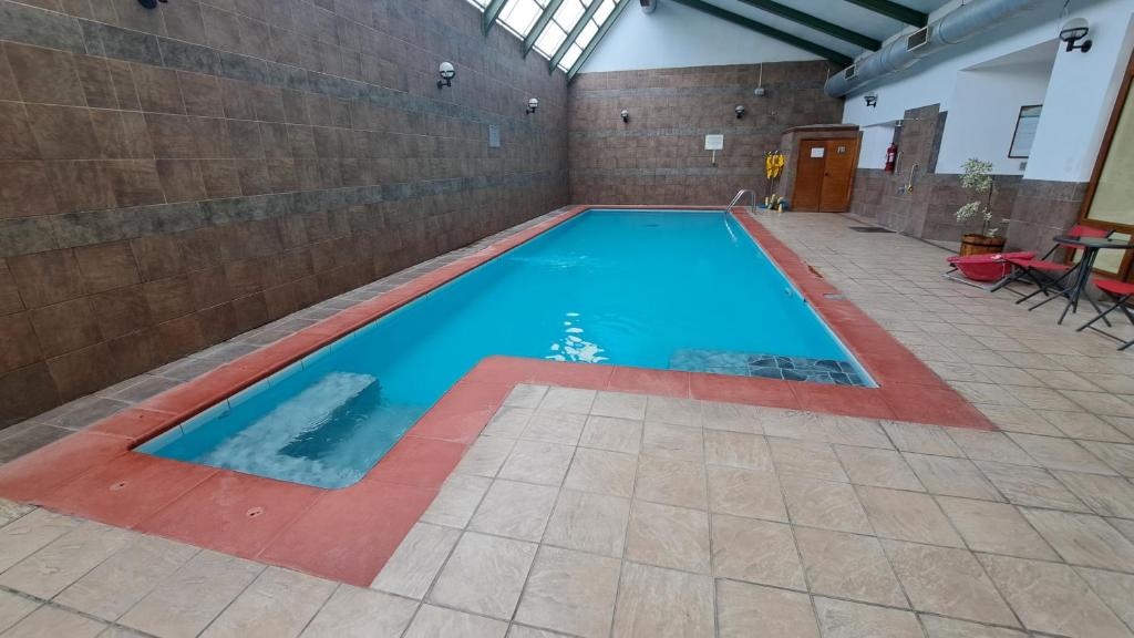 Bazén v ubytování Hotel Diego de Almagro Punta Arenas nebo v jeho okolí
