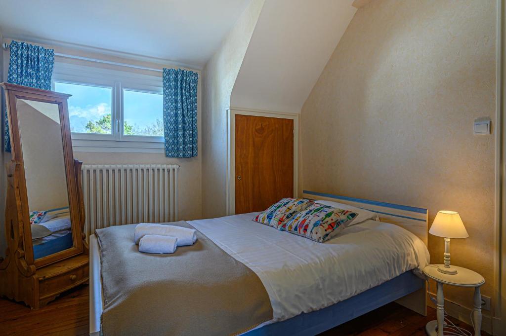 Posteľ alebo postele v izbe v ubytovaní Villa Octave-Odette - 2 min de la plage
