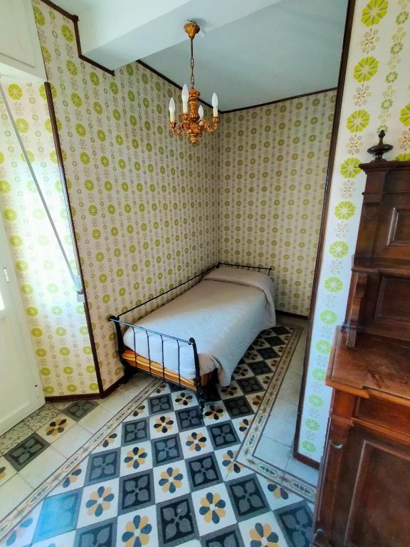 Postel nebo postele na pokoji v ubytování CASA VACANZE "LA QUIETE"
