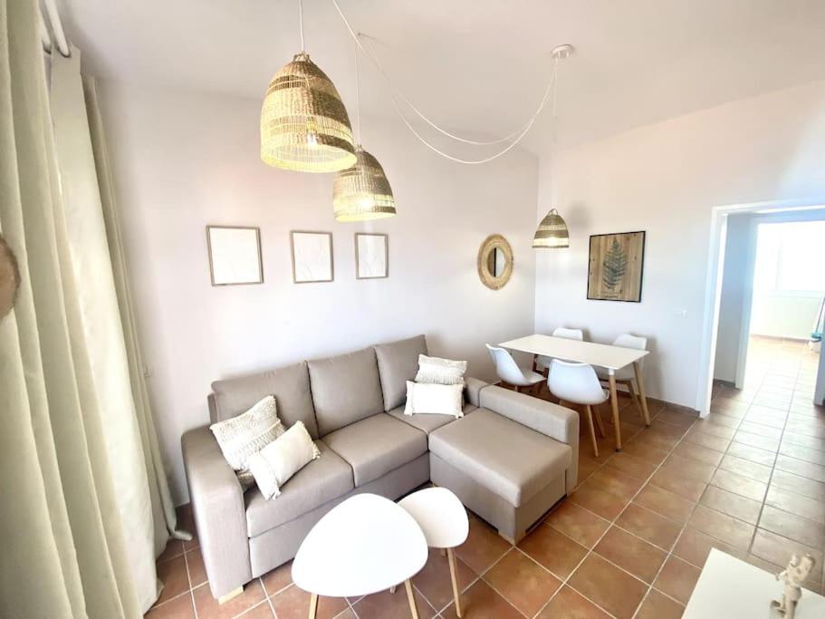 A seating area at Adeje beach apartament + Parking