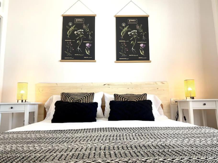 A bed or beds in a room at Adeje beach apartament + Parking
