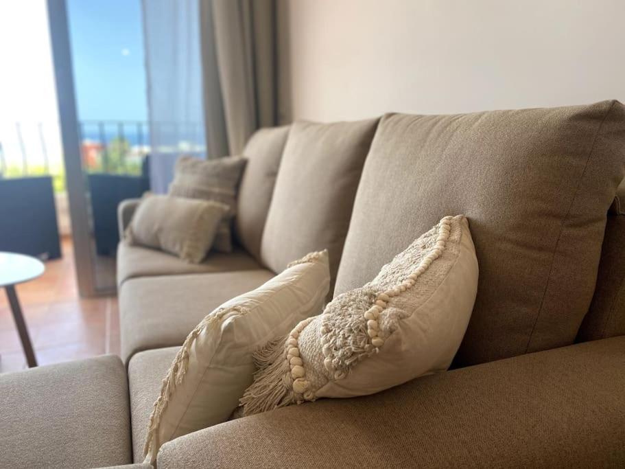 A seating area at Adeje beach apartament + Parking