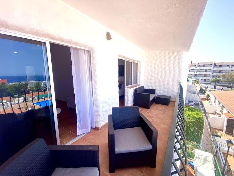 A balcony or terrace at Adeje beach apartament + Parking