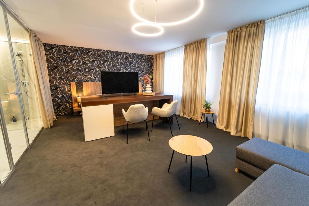 TV a/nebo společenská místnost v ubytování Hotel Zemplín