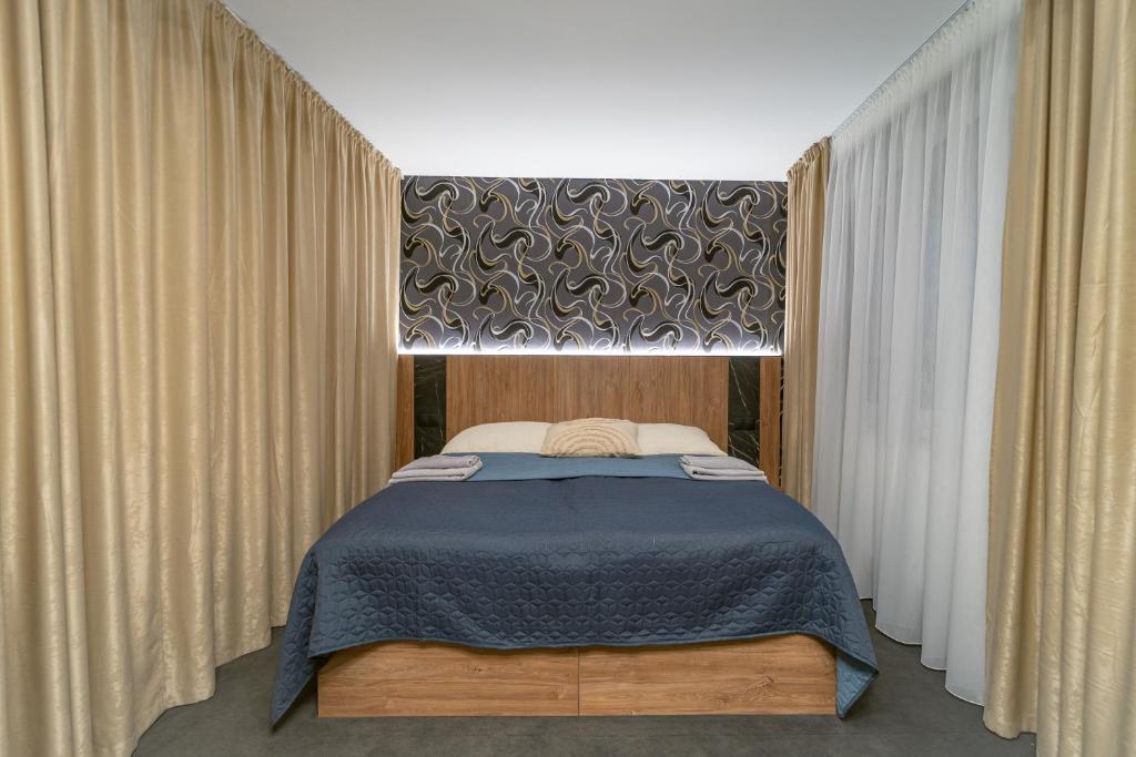 Postel nebo postele na pokoji v ubytování Hotel Zemplín