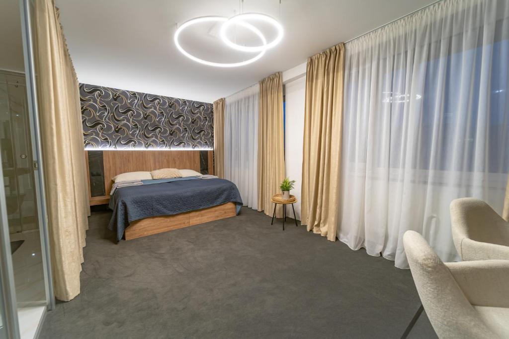 Postel nebo postele na pokoji v ubytování Hotel Zemplín