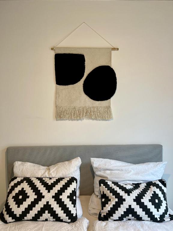 Postel nebo postele na pokoji v ubytování Weinberg-Design-Apartment Stuttgart-Fellbach