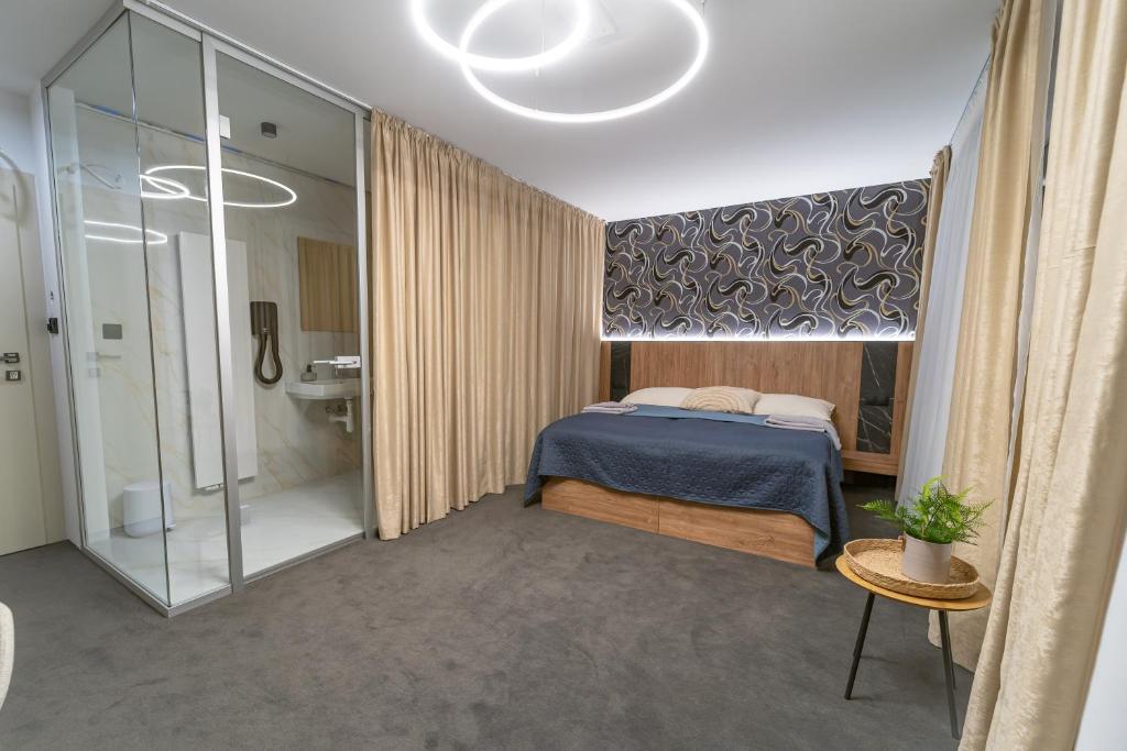 Postel nebo postele na pokoji v ubytování Hotel Zemplín