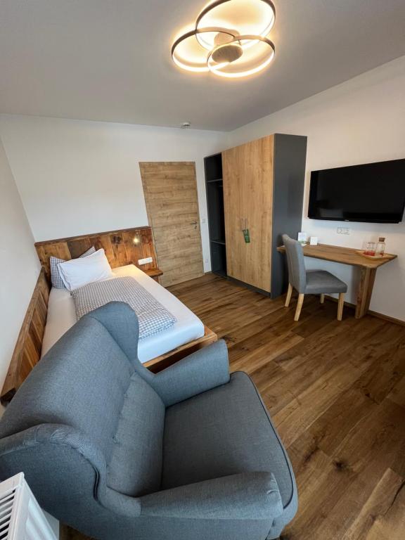 TV a/nebo společenská místnost v ubytování Hotel garni Alpengruss