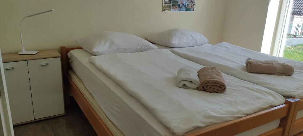 Postel nebo postele na pokoji v ubytování Hacienda Bled Rooms