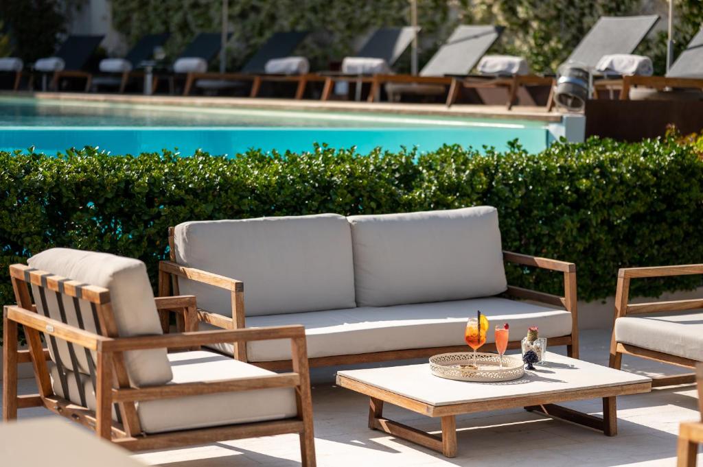 Бассейн в Unìco Boutique Hotel d'Arte или поблизости