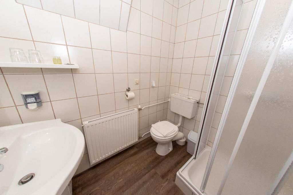 Kúpeľňa v ubytovaní Gästehaus-Pension Familie Dwars