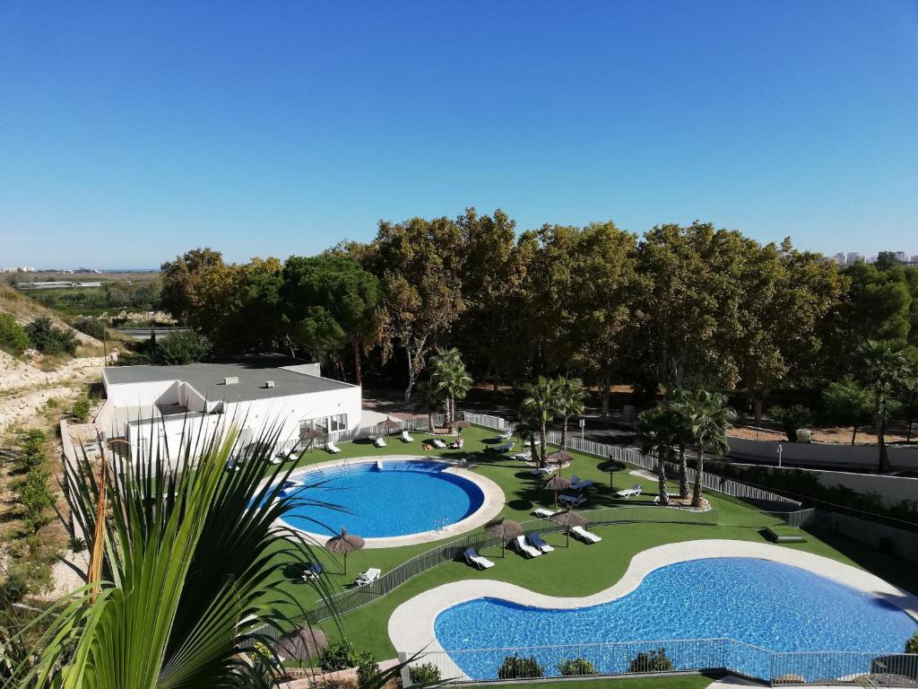 Bazén v ubytování Residencial Xeresa del Monte Solo Familias Serviplaya nebo v jeho okolí