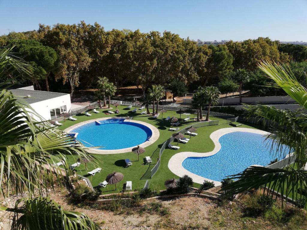 Bazén v ubytování Residencial Xeresa del Monte Solo Familias Serviplaya nebo v jeho okolí