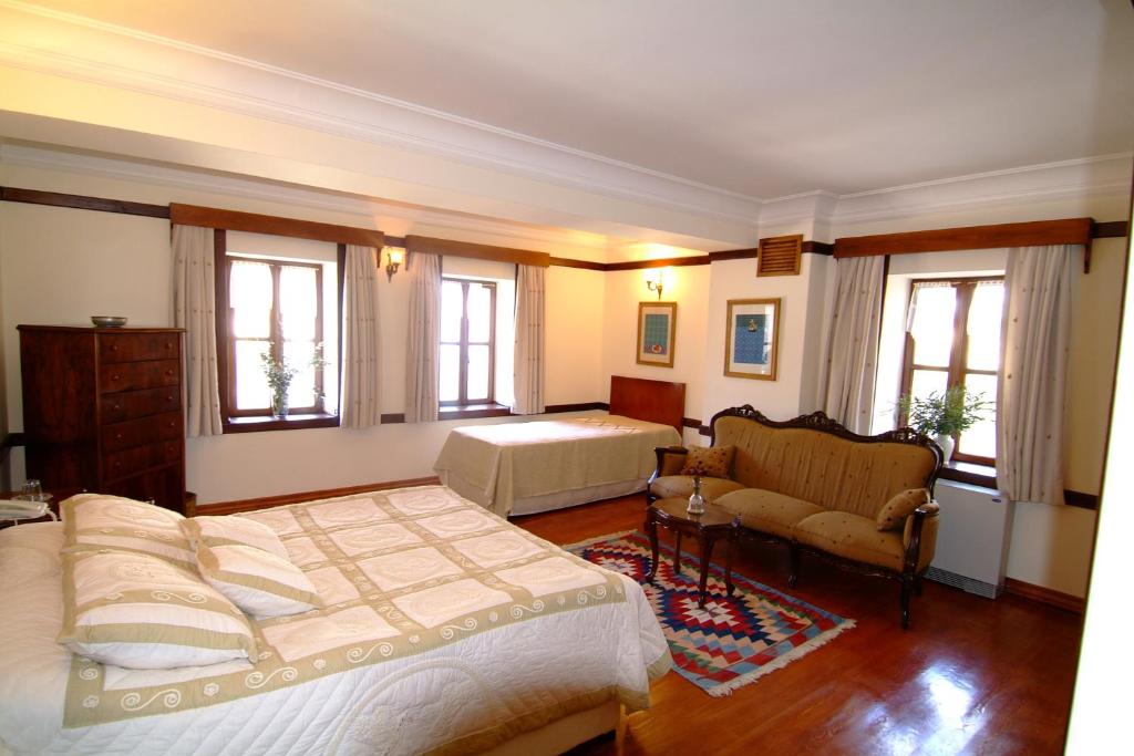 Postel nebo postele na pokoji v ubytování Altın Çeşmeli Konak