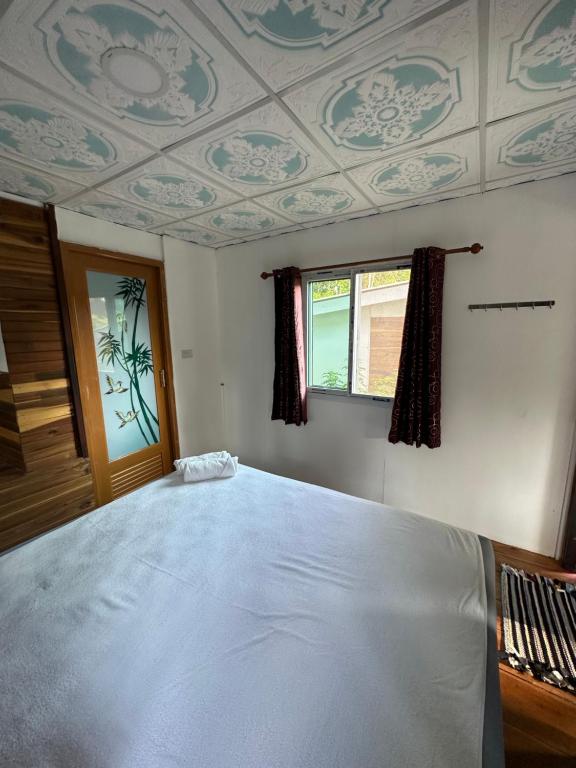 Postel nebo postele na pokoji v ubytování Good Time Resort Koh Kood