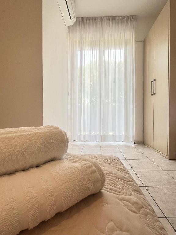 Postel nebo postele na pokoji v ubytování Hotel Rosen Garden