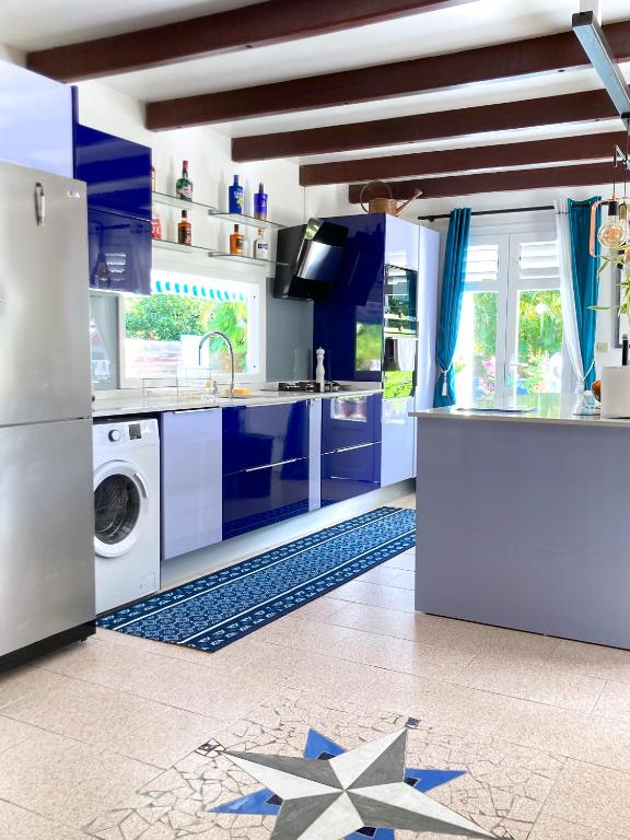 Kuchyň nebo kuchyňský kout v ubytování Villa La Roserie
