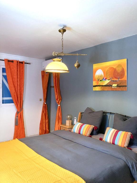 Postel nebo postele na pokoji v ubytování Villa La Roserie