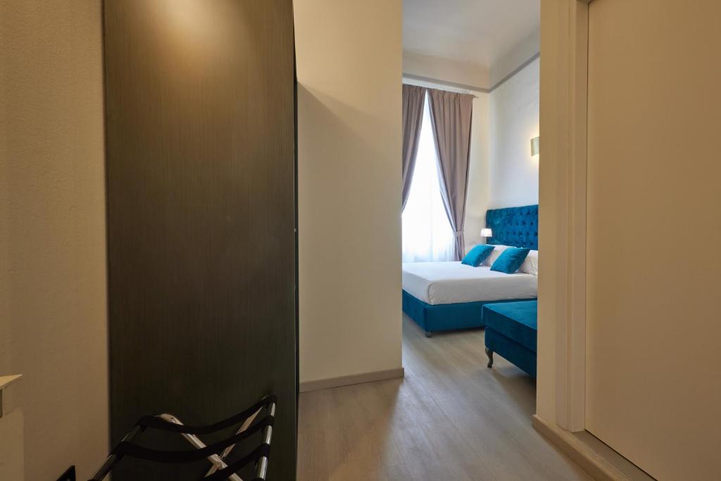 Posteľ alebo postele v izbe v ubytovaní Residenza Maglioni al Battistero