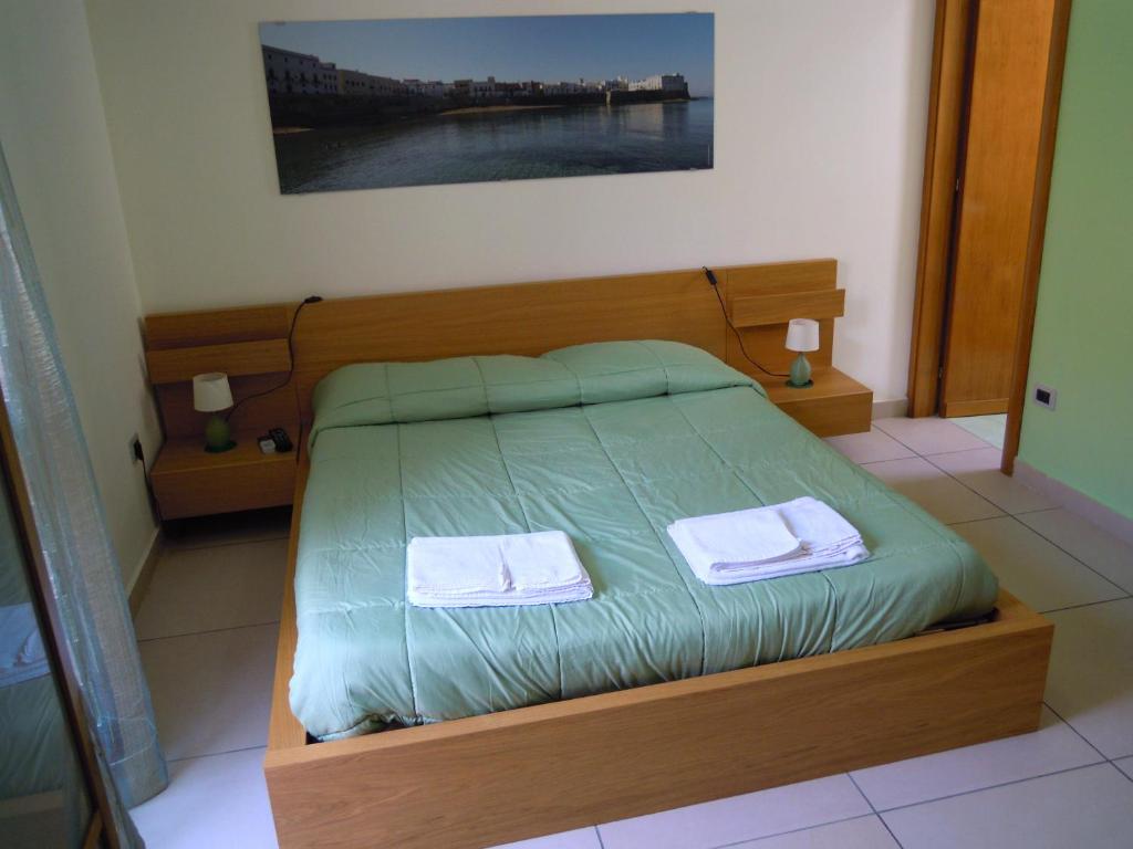 Posteľ alebo postele v izbe v ubytovaní B&B del Lungomare