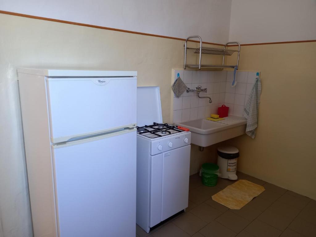 Kuchyň nebo kuchyňský kout v ubytování Casa MAX