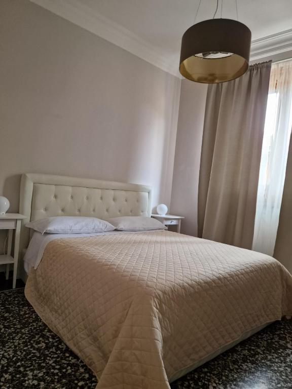 Postel nebo postele na pokoji v ubytování Le logge