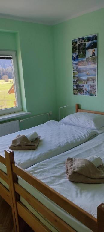Postel nebo postele na pokoji v ubytování Hacienda Bled Rooms