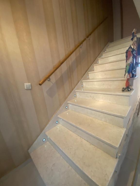 a set of stairs in a room with a toy at Мезонет “Djanina” in Sandanski