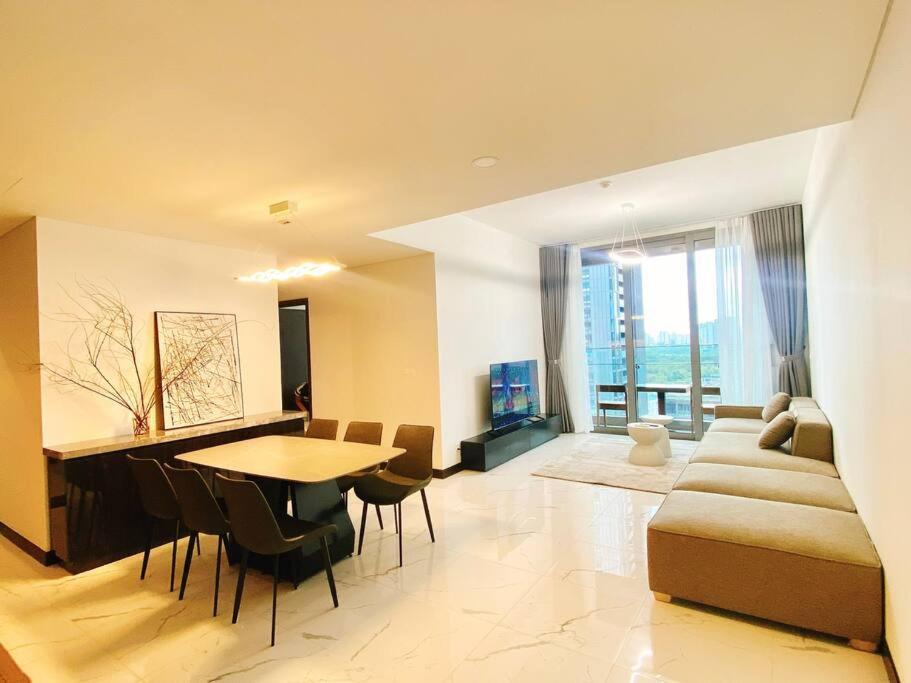 a living room with a couch and a table at Morden 2brs apartment at Empire City in Ho Chi Minh City