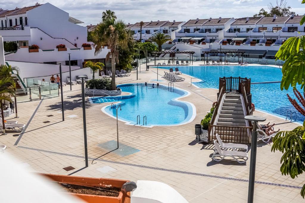 an image of a swimming pool at a resort at Parque don Jose apartment in Costa Del Silencio