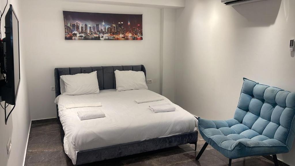 Postel nebo postele na pokoji v ubytování Elven Hotel