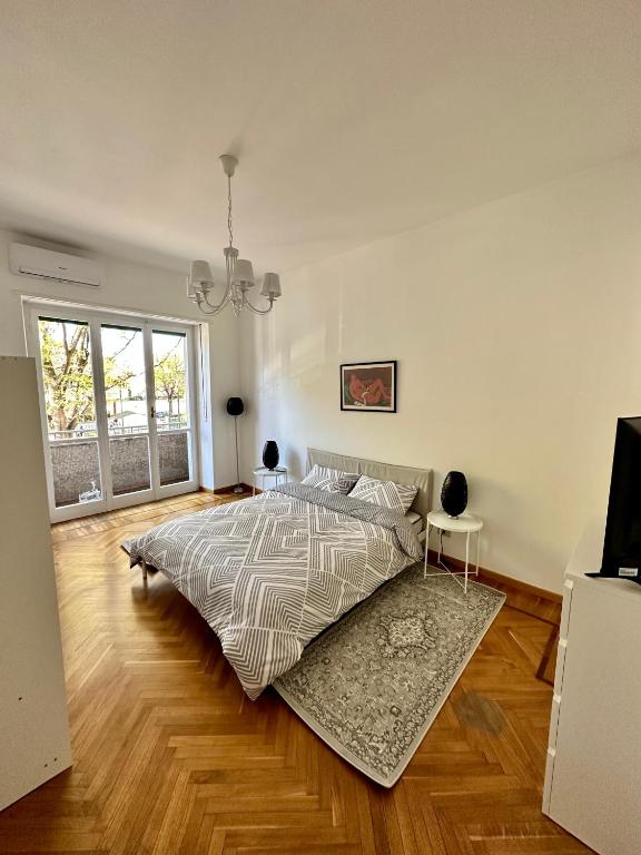 Postel nebo postele na pokoji v ubytování Casa Sebastopoli - vicino Pala Alpitour