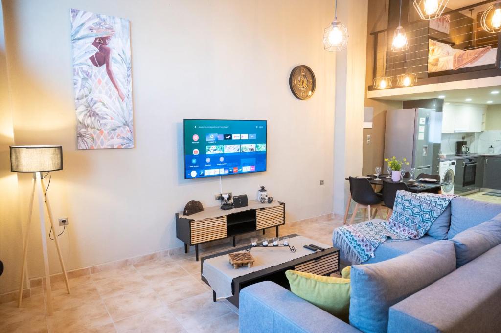 TV a/nebo společenská místnost v ubytování G&M family Lake and sea view!