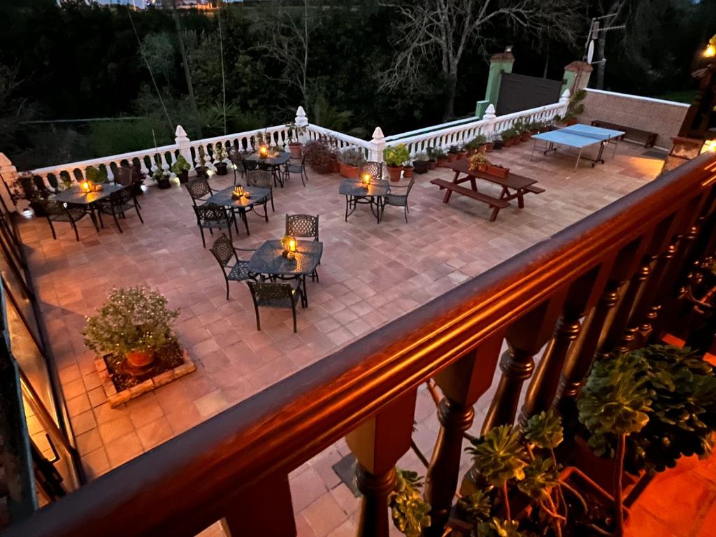 an overhead view of a patio with tables and chairs at Posada La Vieja Escuela in La Revilla