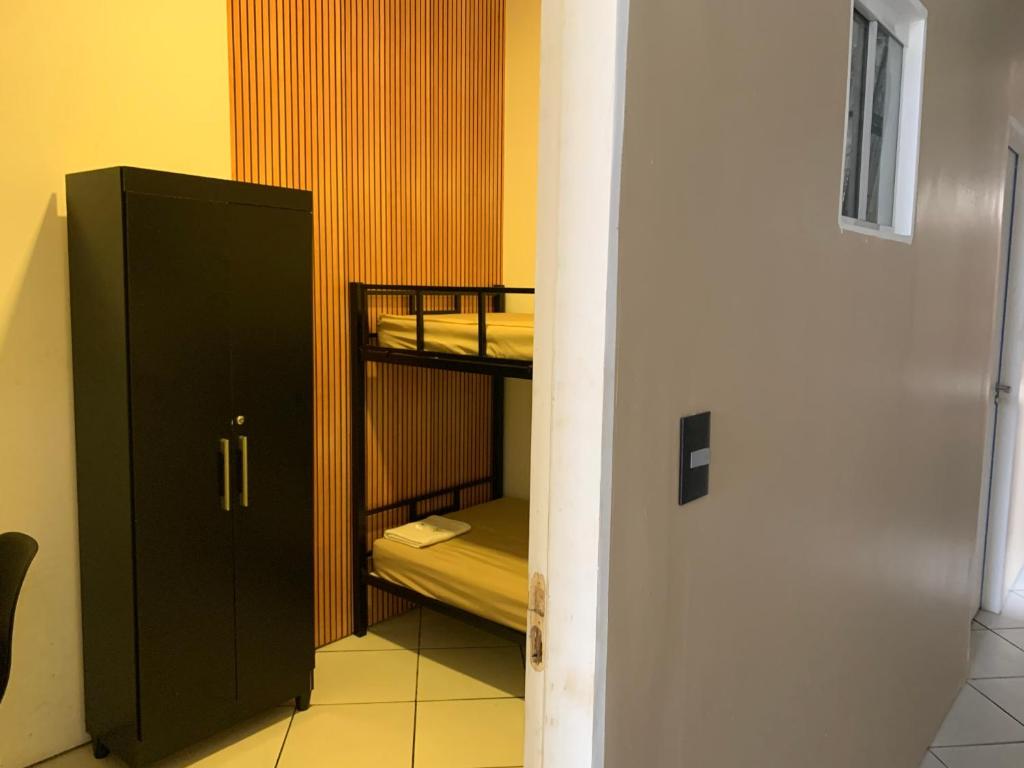 Palanda nebo palandy na pokoji v ubytování Pousada Internacional EAS 10min Aeroporto