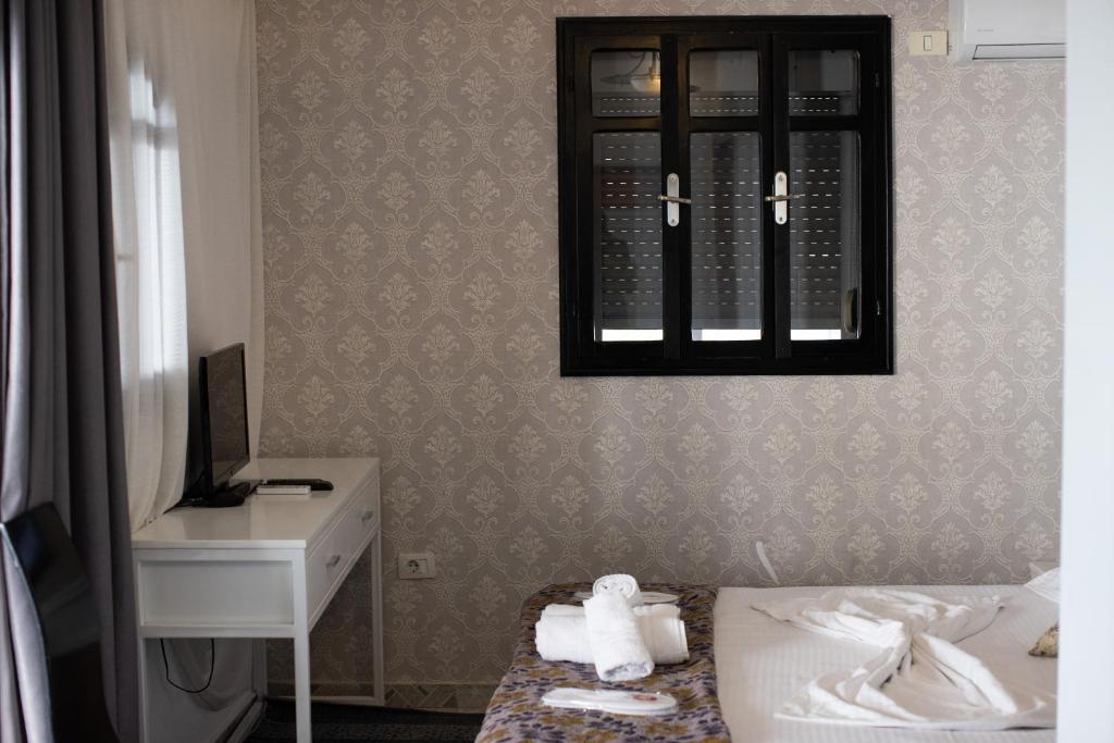 Postel nebo postele na pokoji v ubytování VILA SANREMO