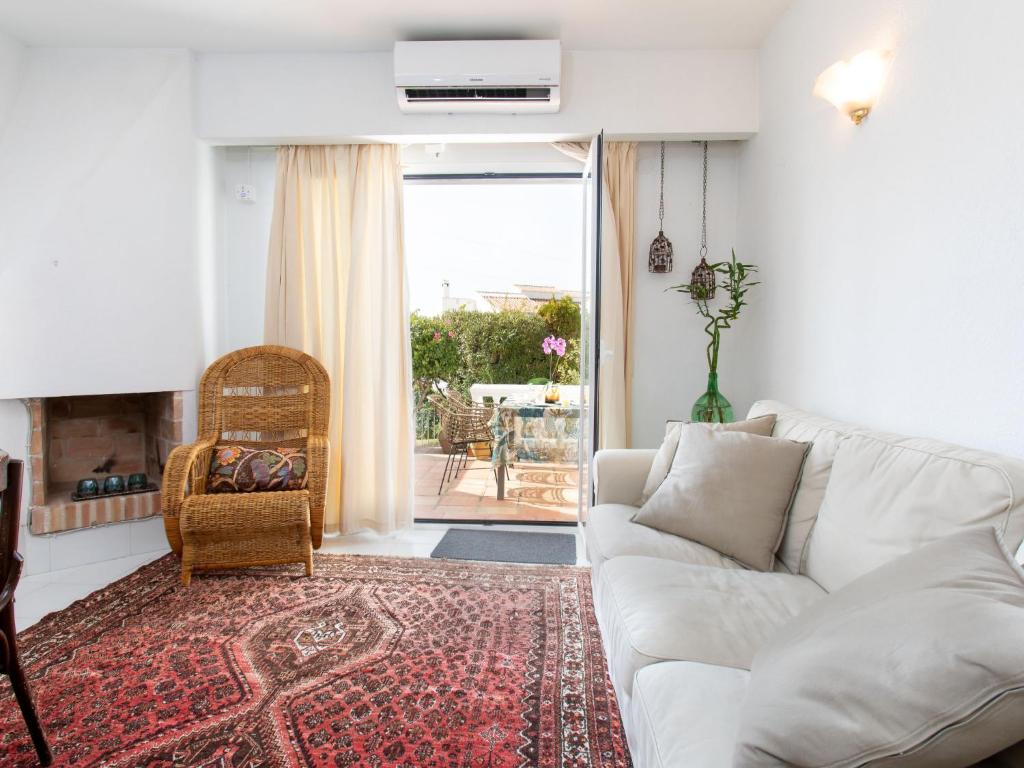 A seating area at Holiday Home Jardines de Nerja by Interhome
